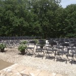 outside wedding black chairs